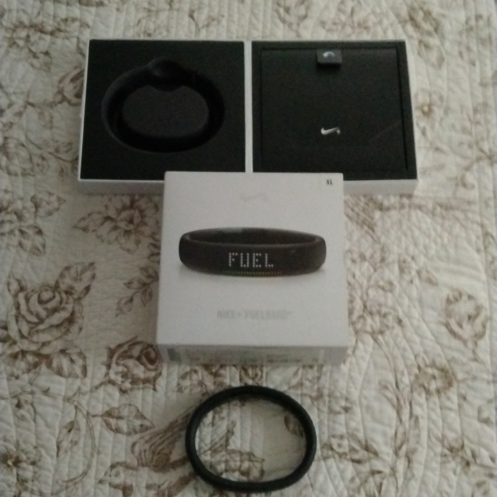 Nike+ fuel and with extra links, box and paperwork xl